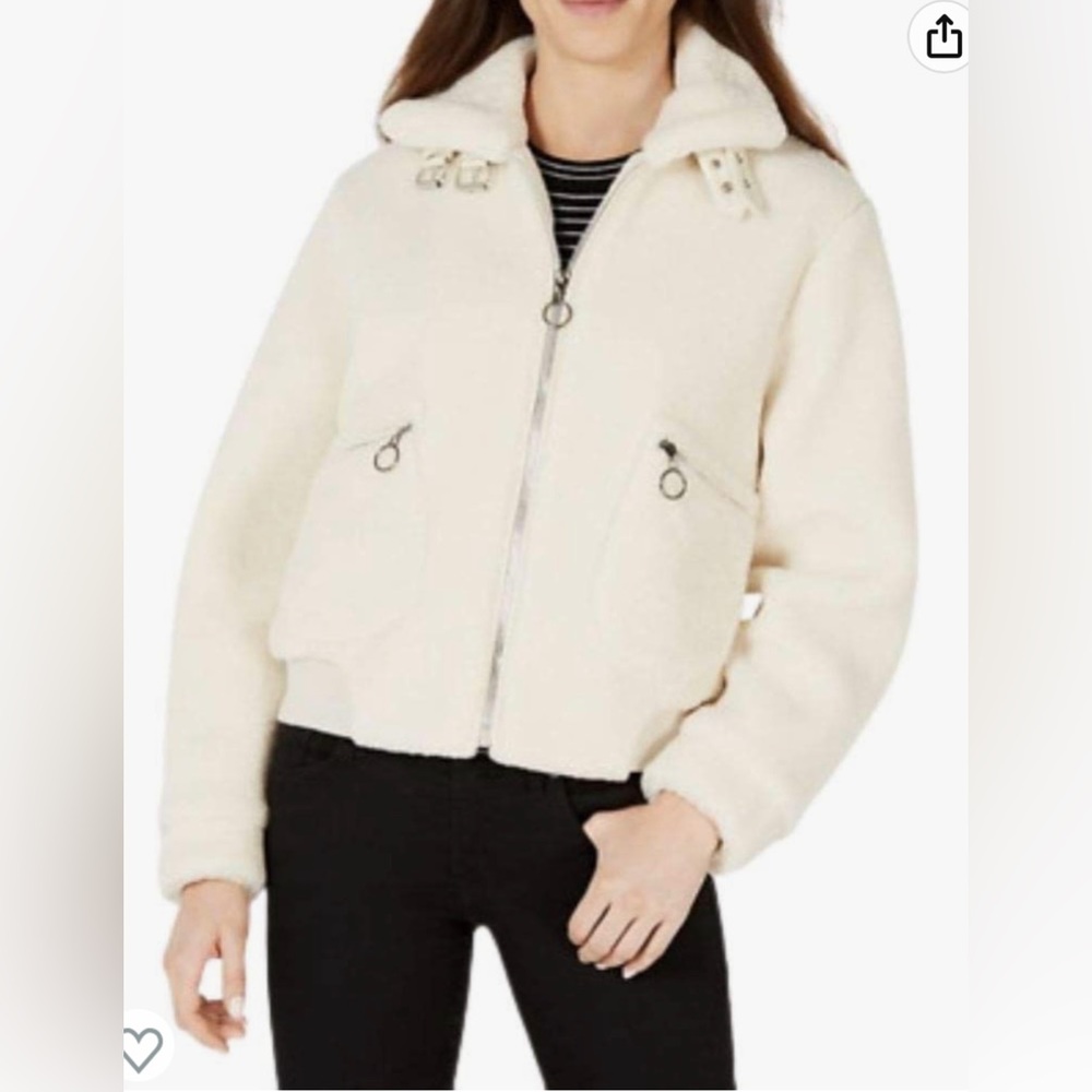 Fun and trendy bomber style faux fur Ivory colored coat with cute buckle…